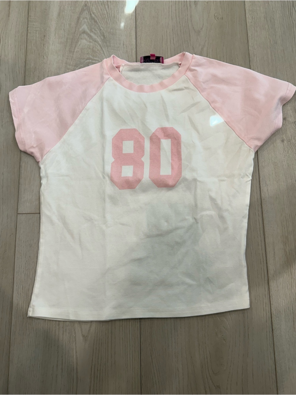 Eddicted pink baby tee